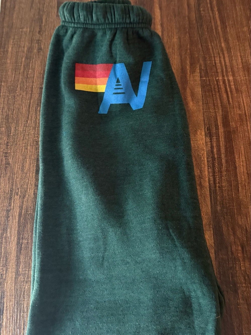 Aviator Nation Forest Green Track Pants with Blue Logo and Rainbow Stripe
